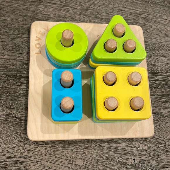 Lovevery Toys Lovevery Sort Stack Peg Puzzle 283months Poshmark